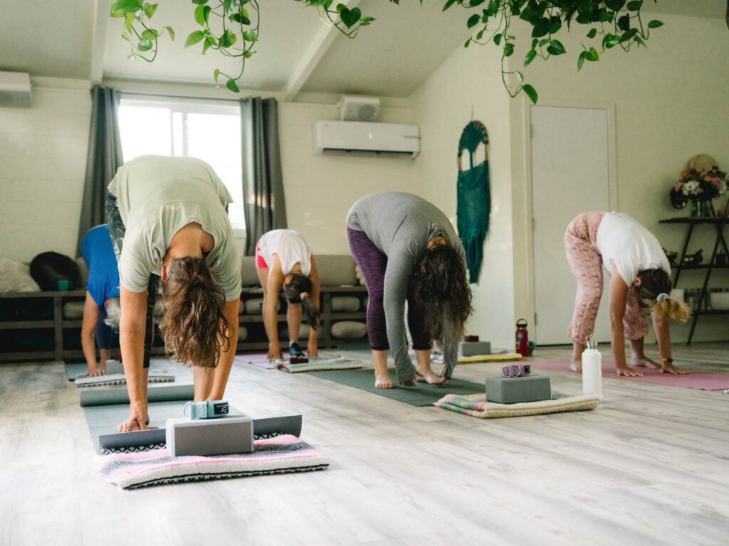 Sedona yoga retreat class forward fold