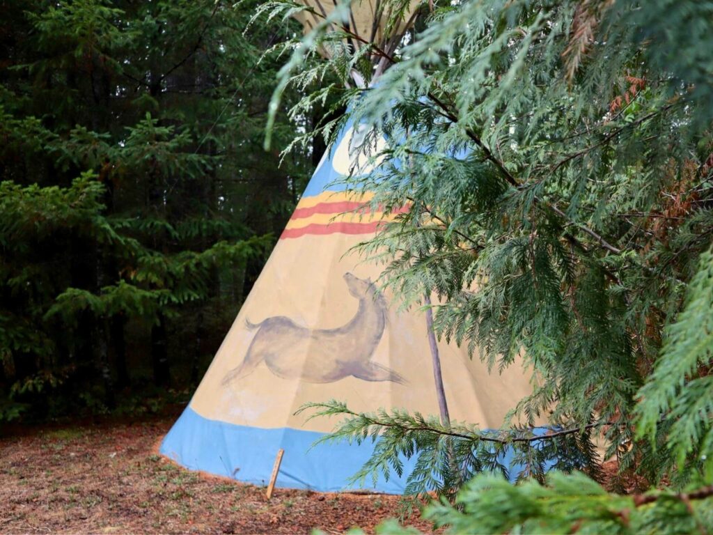 private tipi at the edge of the forest at yoga retreat in Oregon