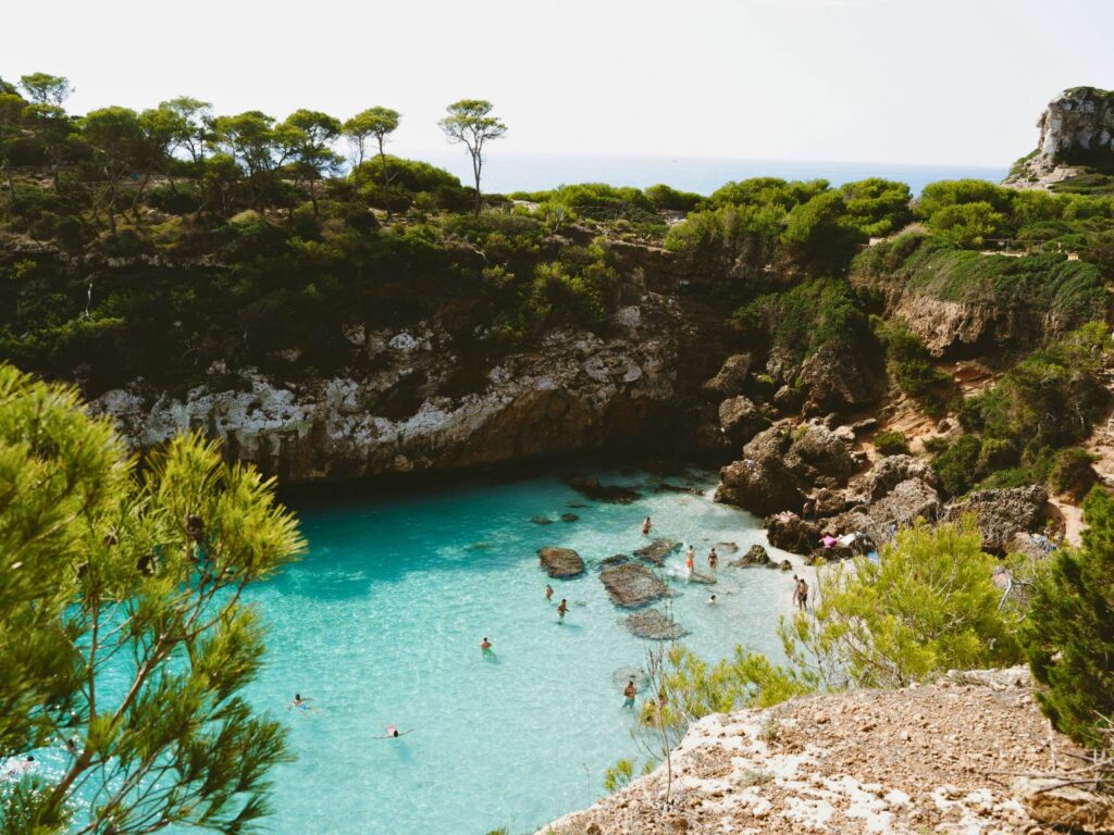 crystal clear water in a calm cove during Mallorca yoga retreat
