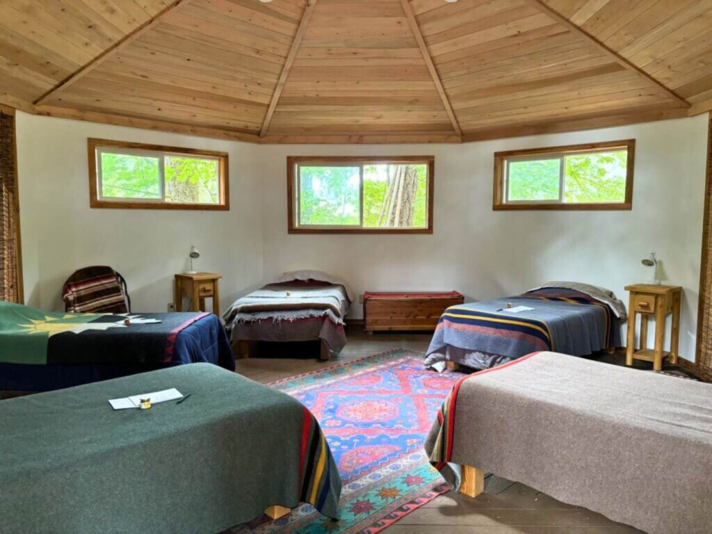 the octahut is an 8 sided structure that sleeps 5 affordably at the Back to nature women's yoga retreat in Oregon