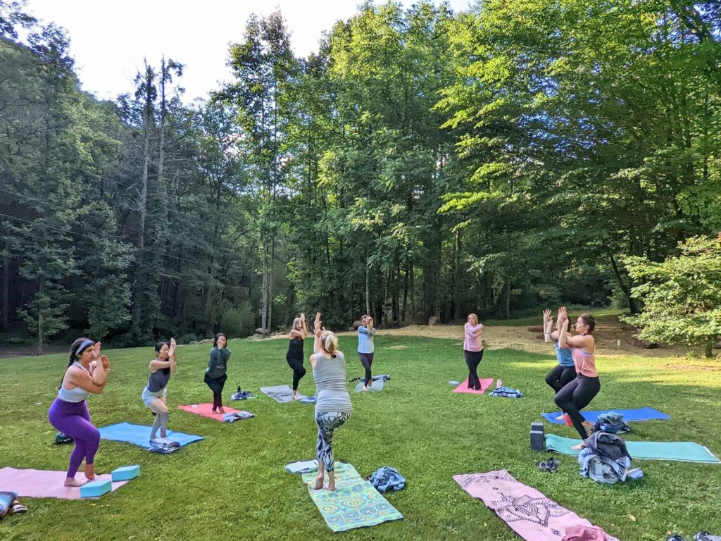 outdoor yoga class at women's yoga retreat near asheville, nc
