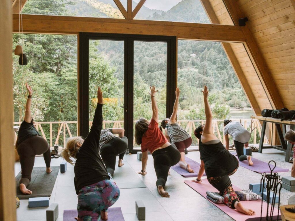 revolved lunge during yoga retreat class in Patagonia