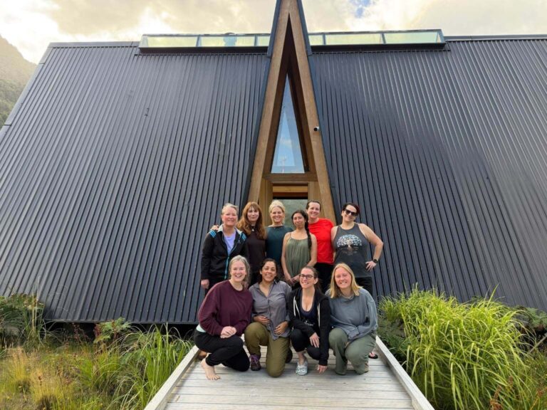 Yoga retreat group photo during yoga retreat in Patagonia at Tawa Refugio — afford a yoga retreat like this bucketlist offering