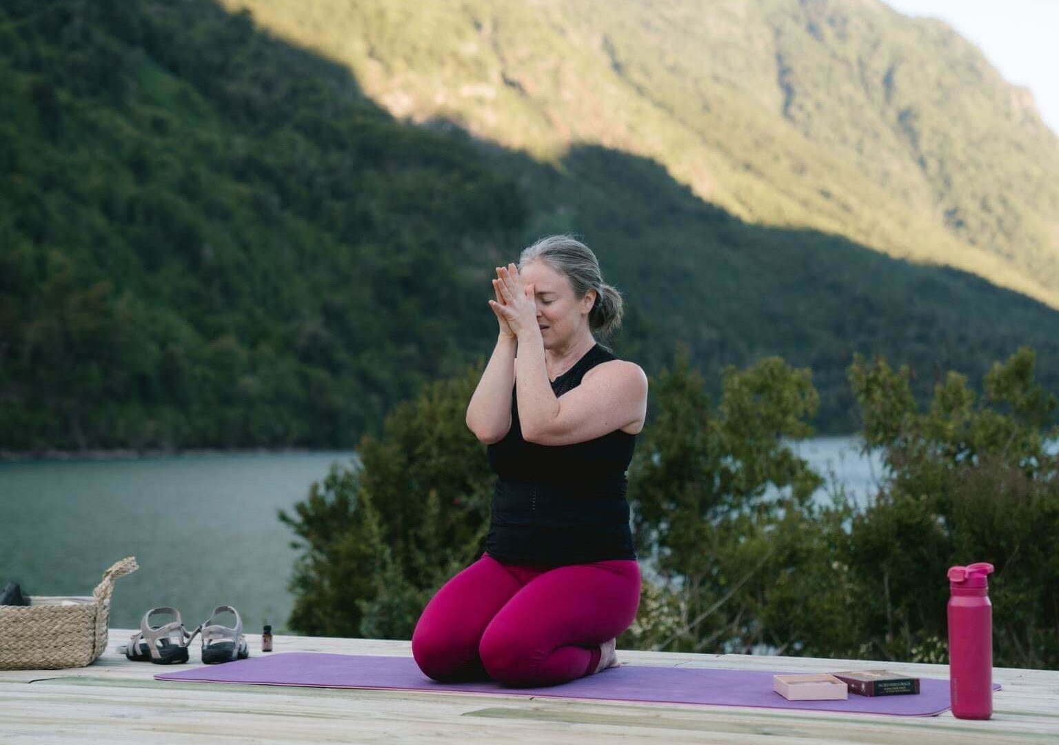 Autumn teaching an inner light meditation to reconnect with yourself on a yoga retreat