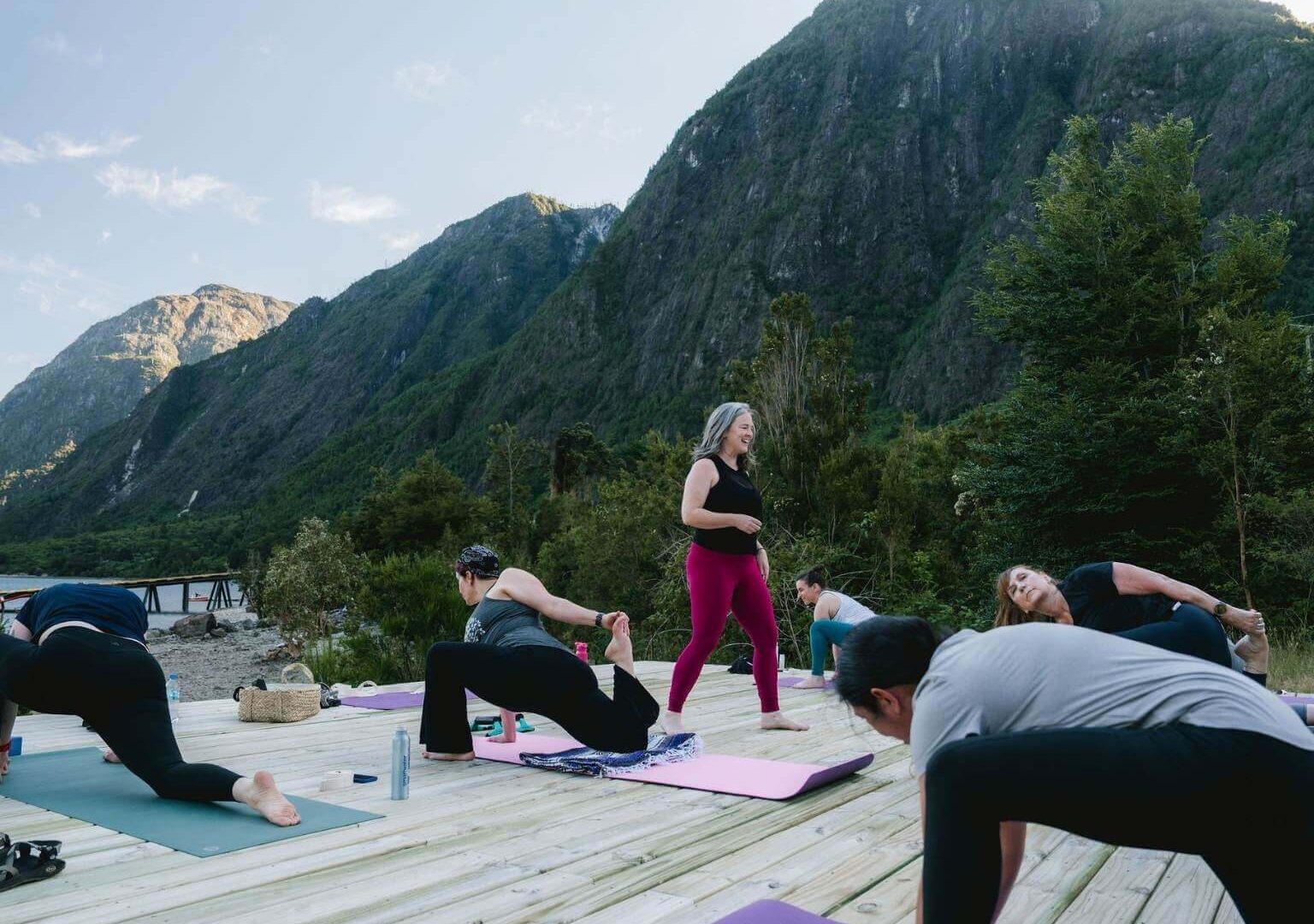 sunset yoga class on a helipad at yoga retreat in Patagonia