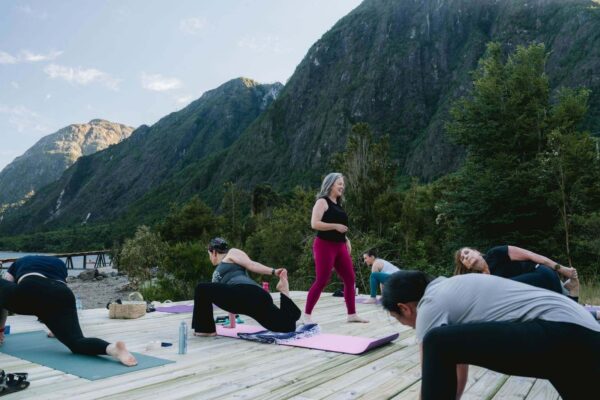 sunset yoga class on a helipad at yoga retreat in Patagonia