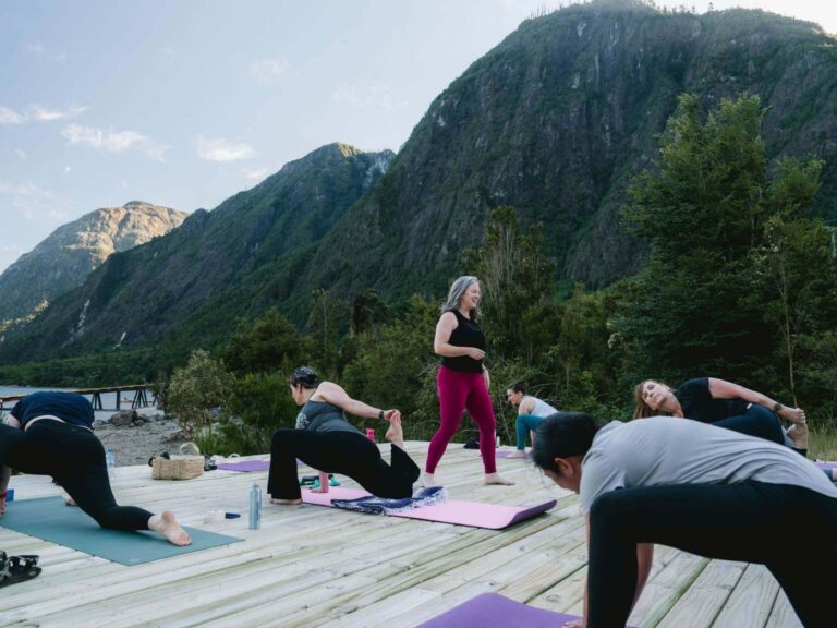 sunset yoga class on a helipad at yoga retreat in Patagonia