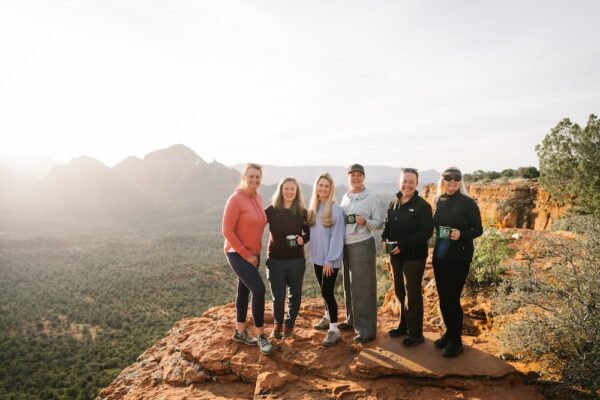 who goes on a yoga retreat picutre of happy middle aged women on a retreat in sedona
