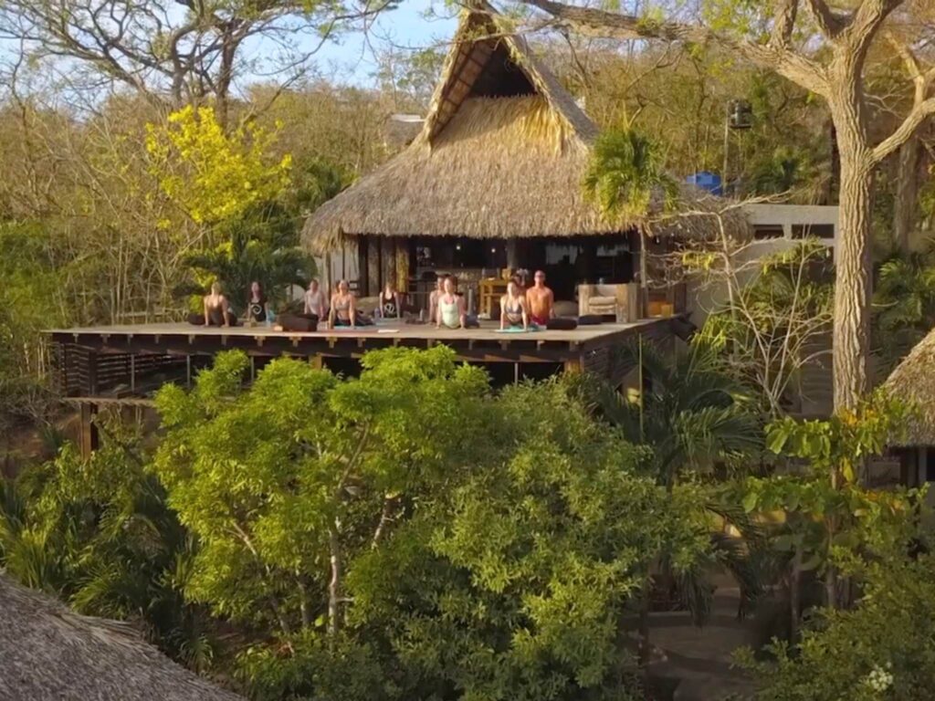yoga teacher trainees practicing at sunset in Nicaragua