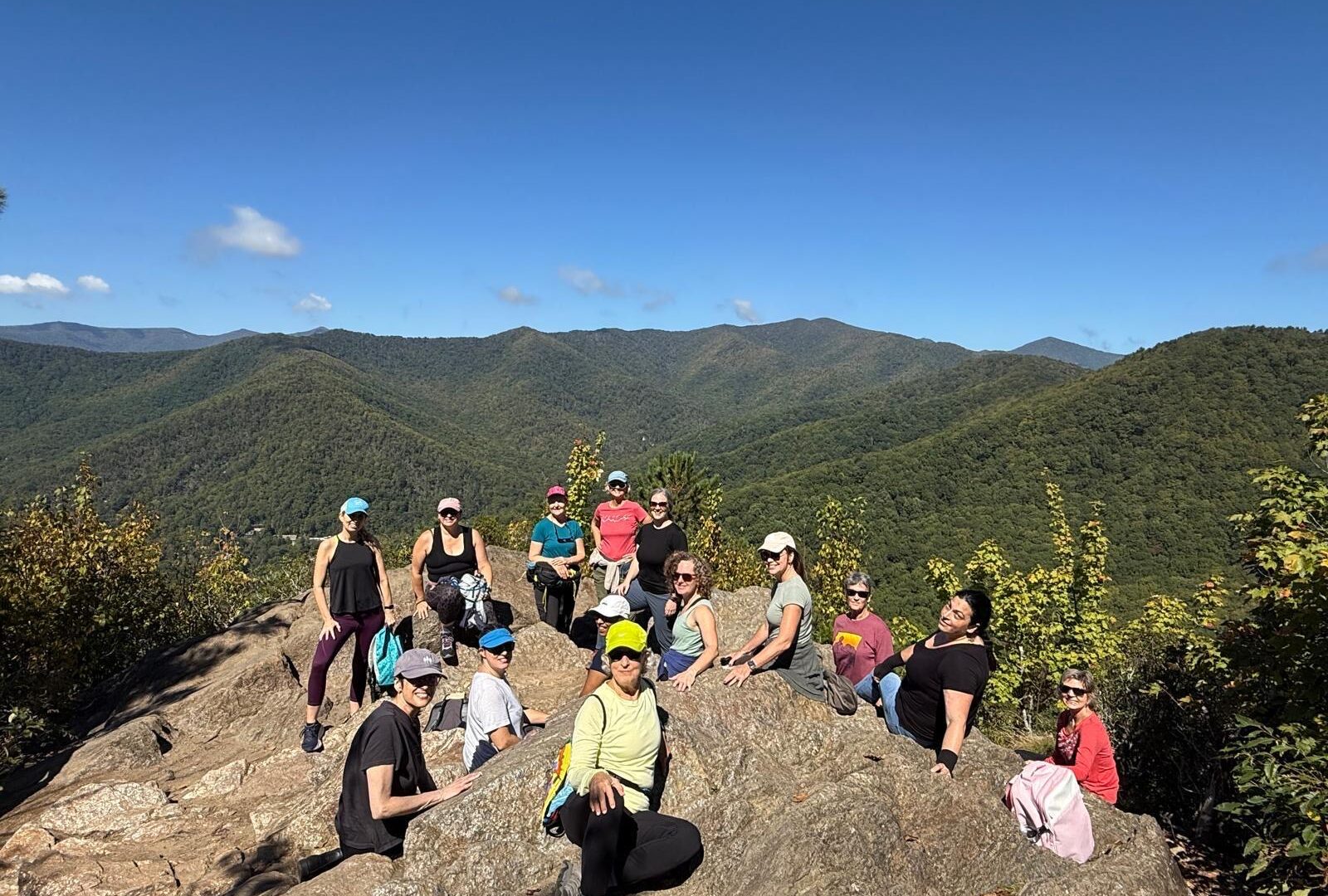 Women enjoying an Asheville area hike during a yoga retreat weekend
