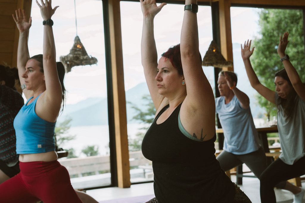 yoga teacher training students practicing morning vinyasa