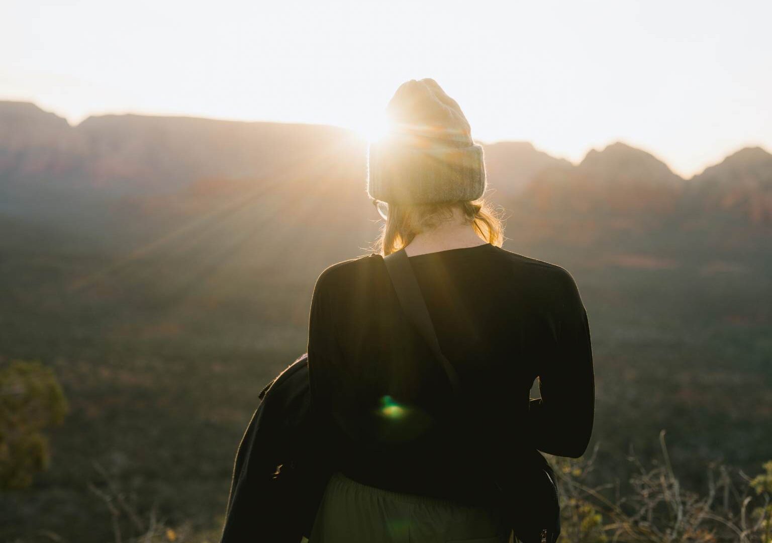 a quiet moment journaling at sunrise during a yoga retreat